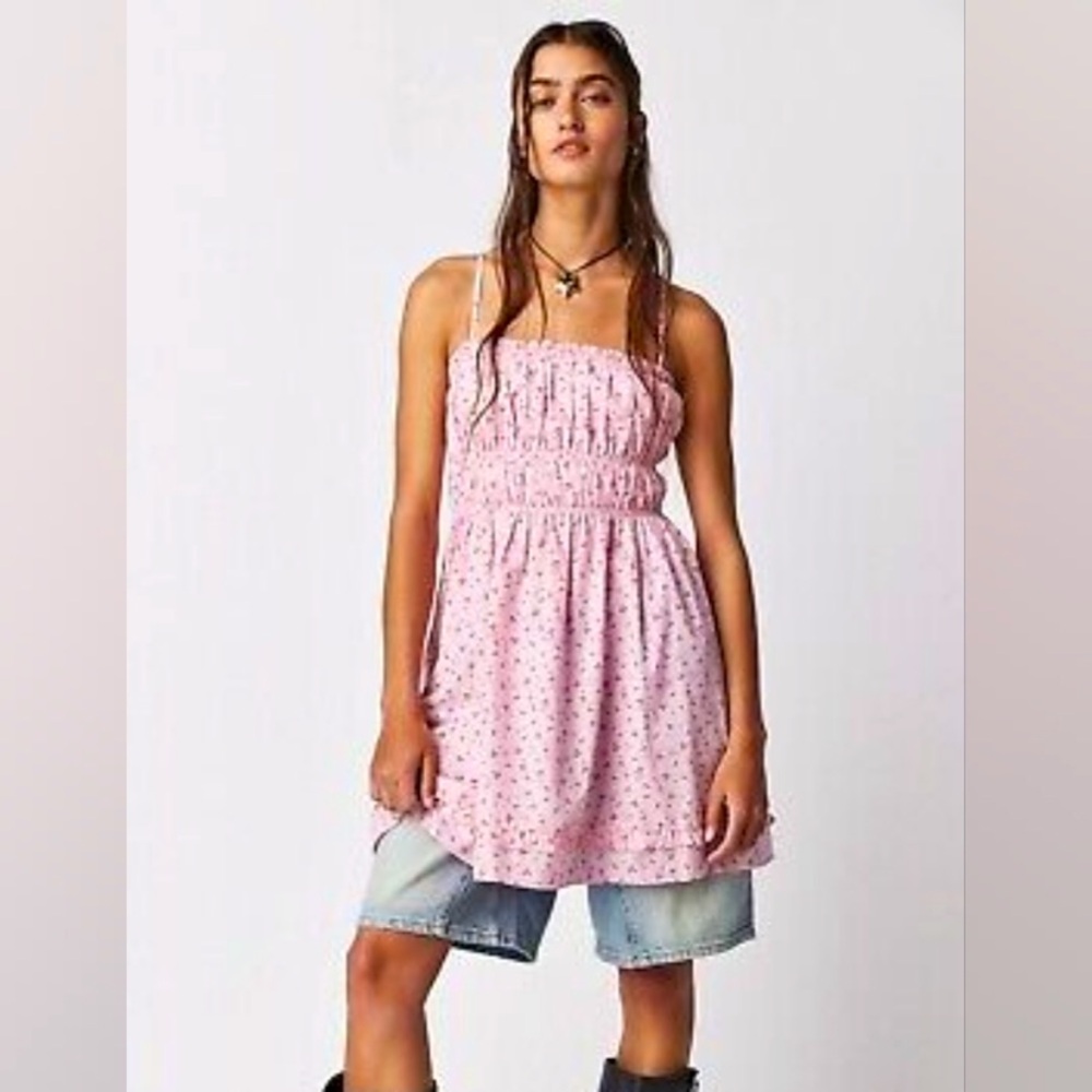 NWT Free People Gabby Mini Dress Size Small has pockets and stretches adjustable